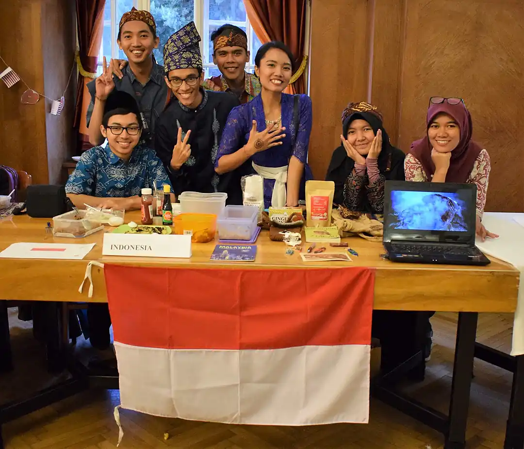 The Indonesian team at our booth with the flag, food, and Wonderful Indonesia video